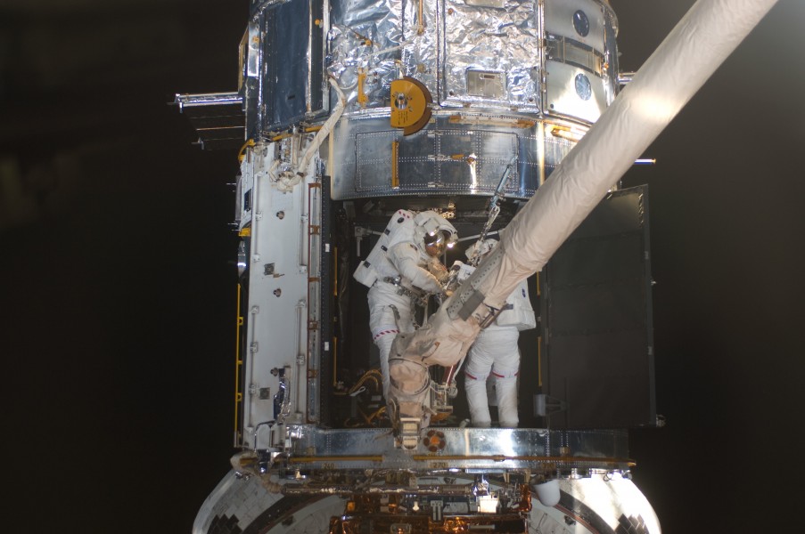 STS-125 EVA4 Working inside Hubble