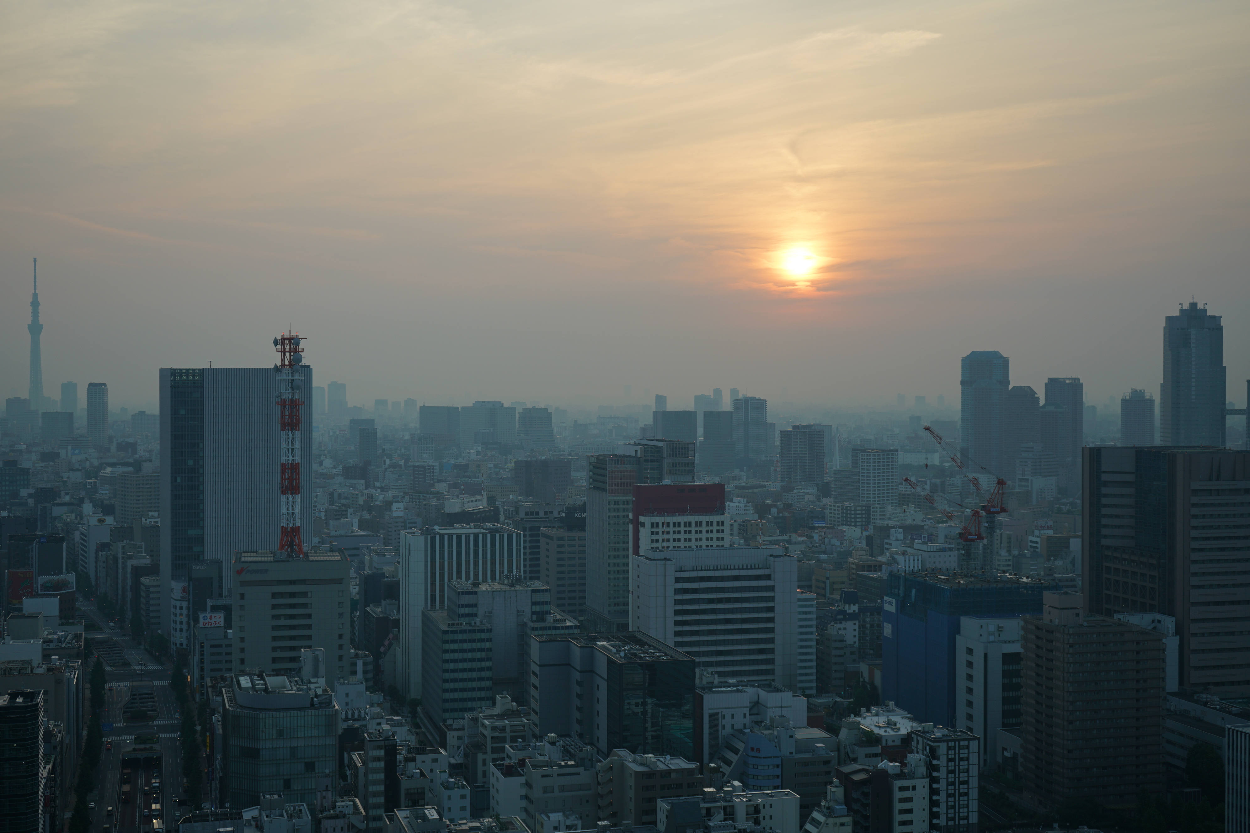 A sunrise and skyscrapers as seen from Shiodome, Tokyo