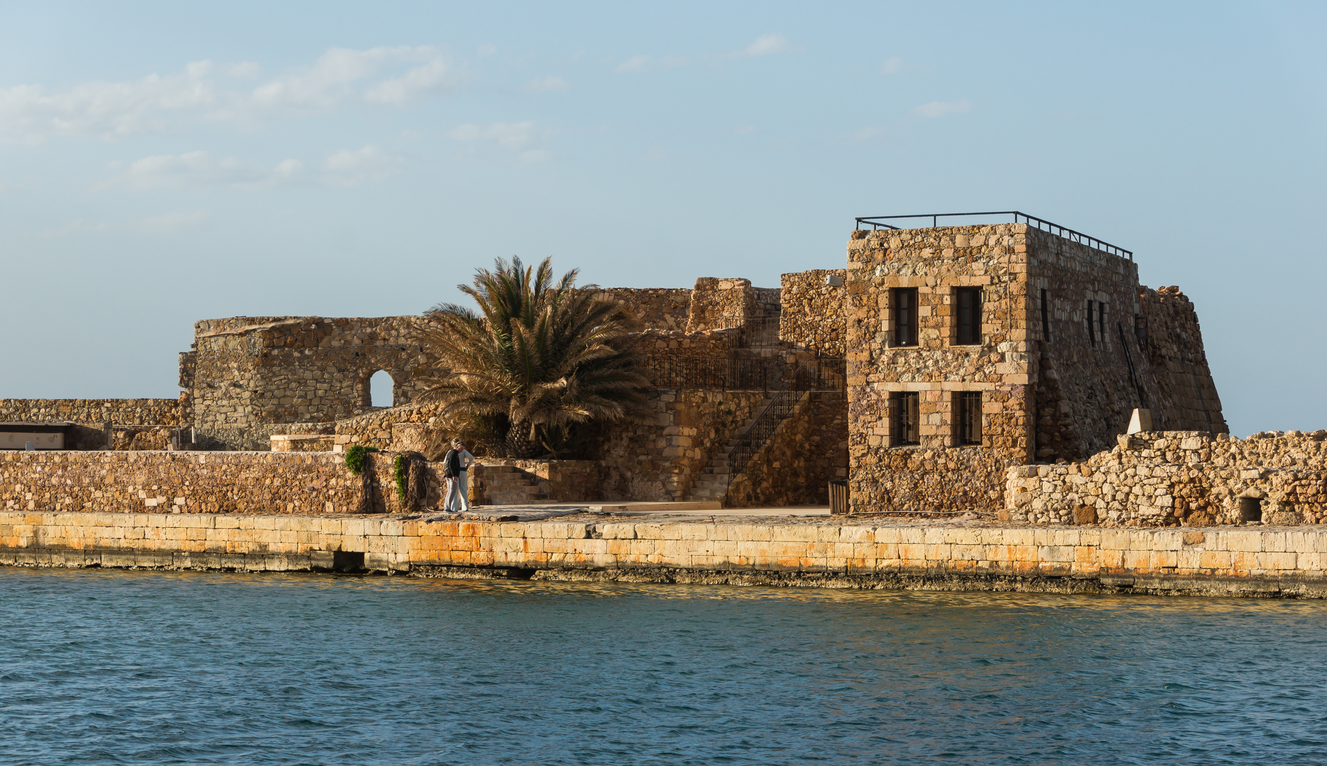 Building dam harbour Chania evening sun