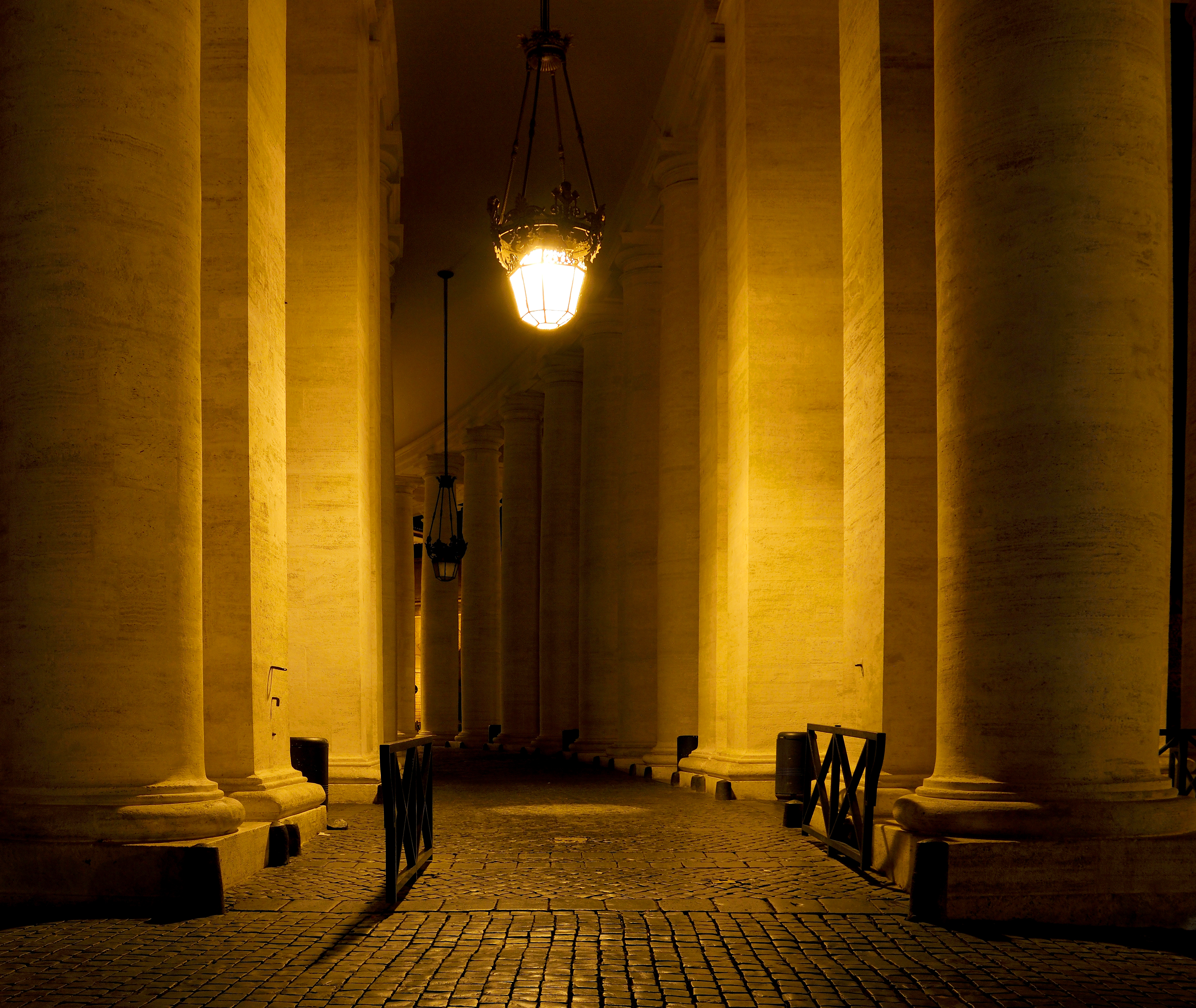 Colonnade of St. Peter at night