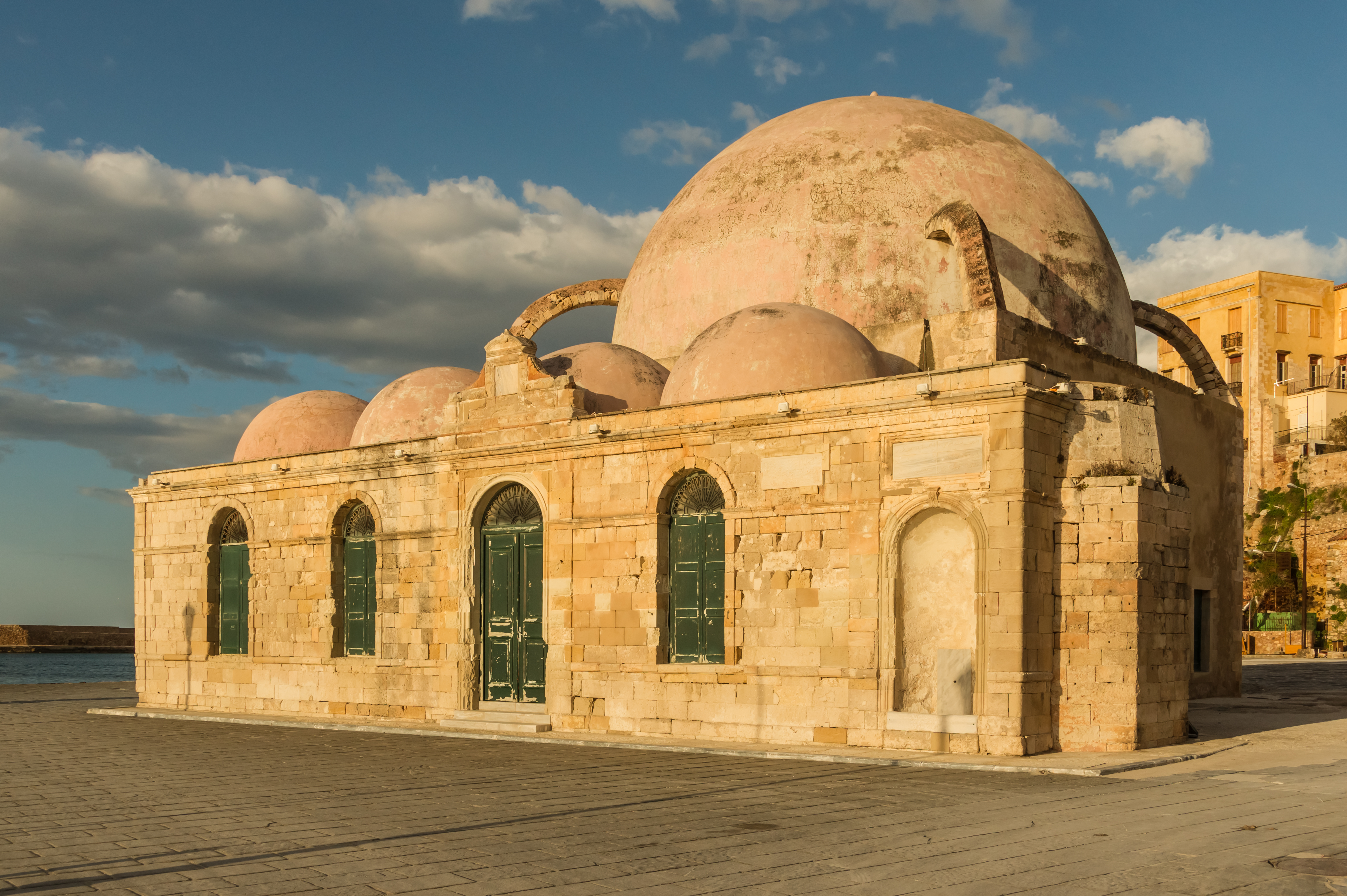 Former mosque harbour Chania evening sun