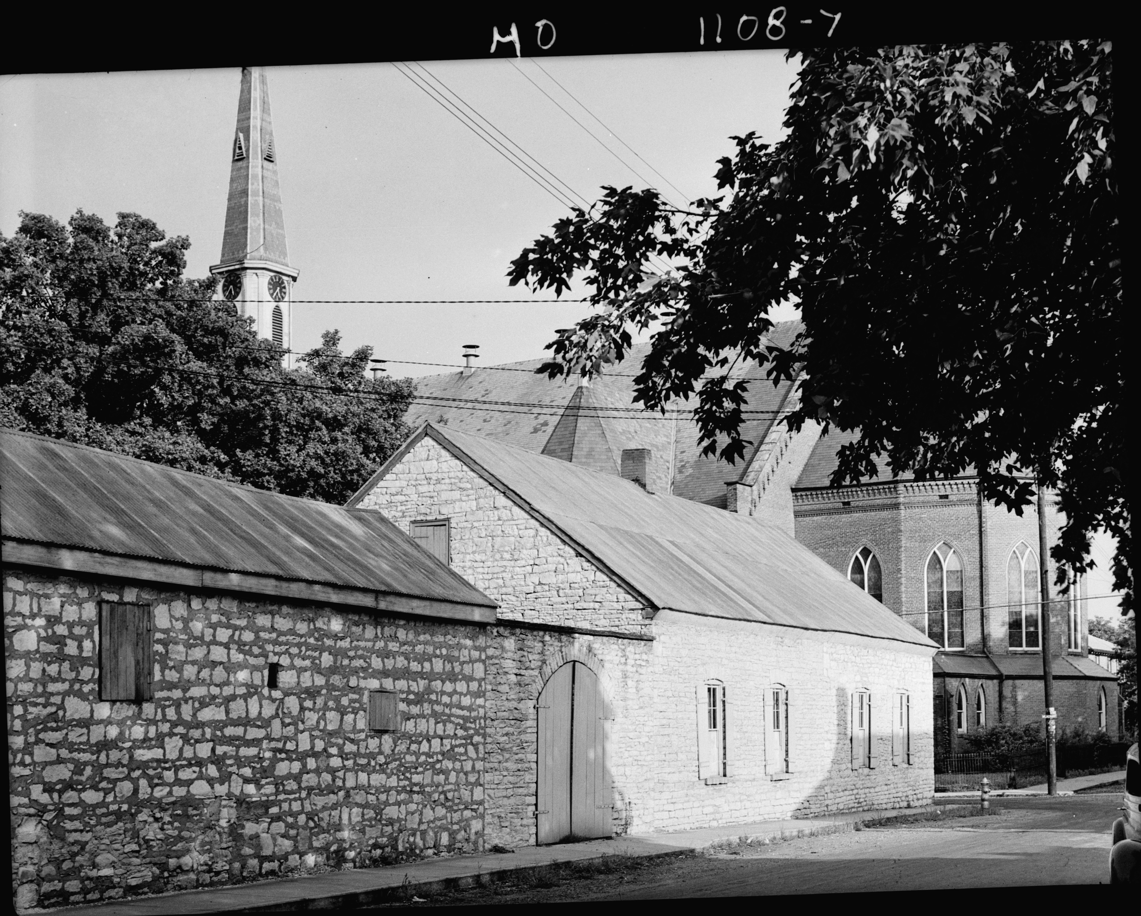 Photograph of the Pratte Warehouse and Church in in Ste Genevieve MO