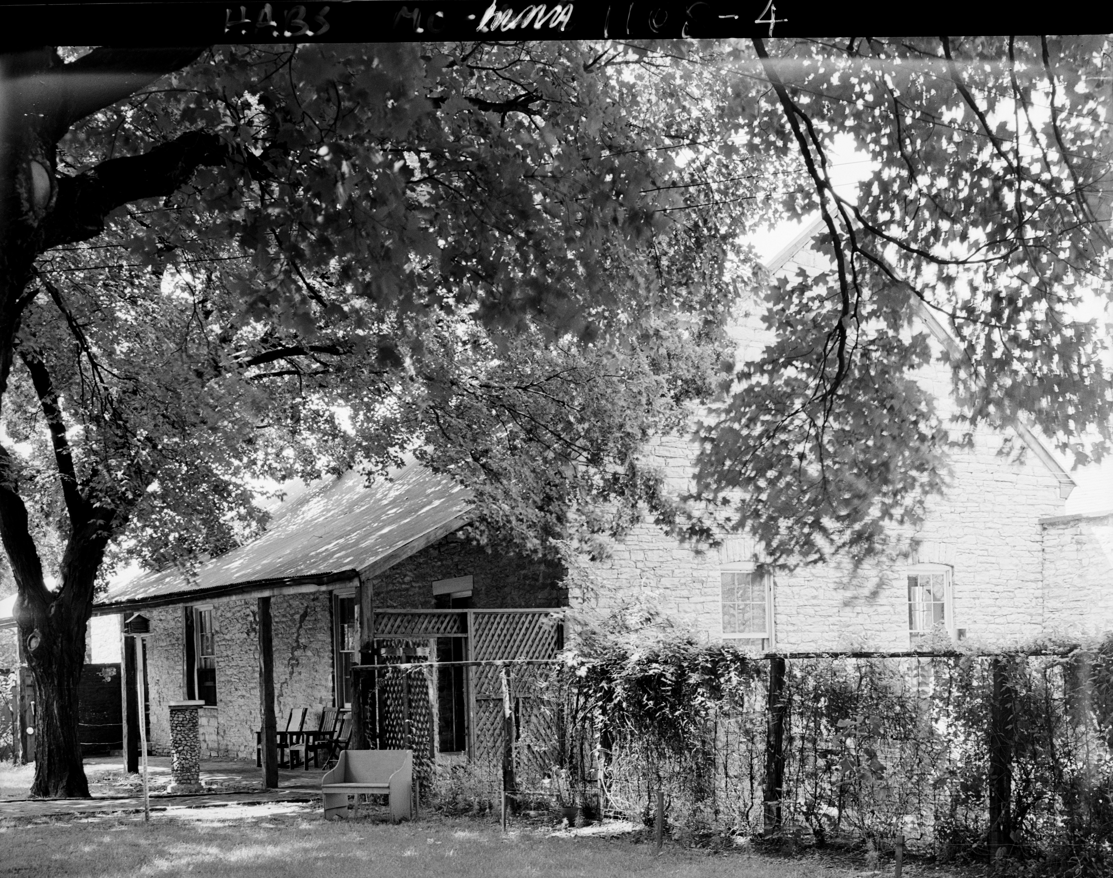 Photograph of the Yard of the Pratte Warehouse and Church in in Ste Genevieve MO