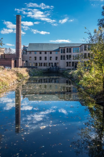 Stanley Woolen Mill Uxbridge MA reflected in Blackstone canal