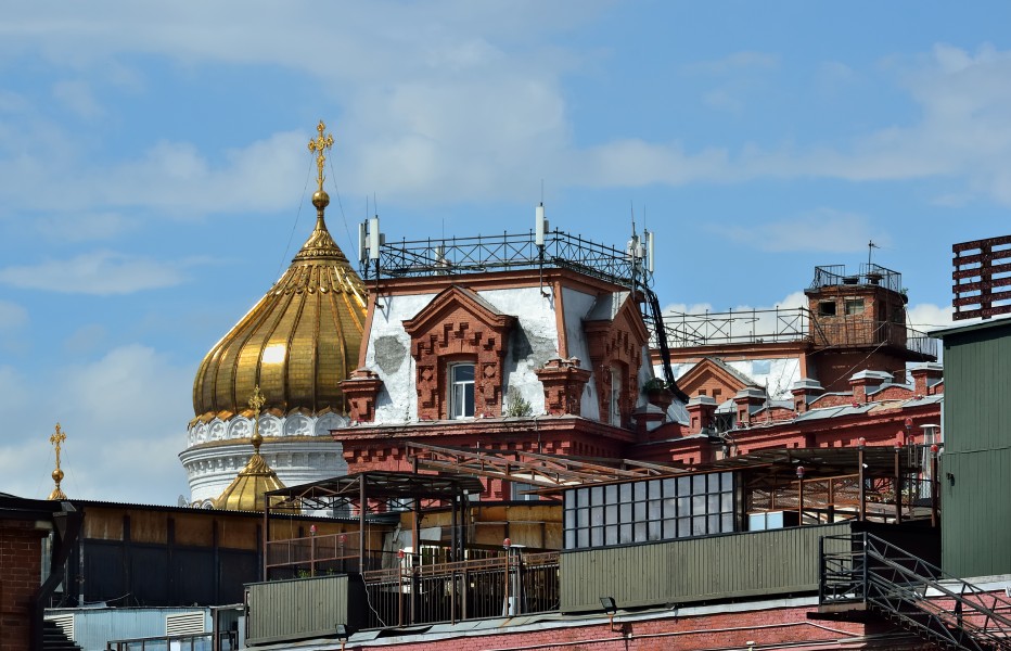 A building of Red October confectionery and dome of Cathedral of Christ the Saviour