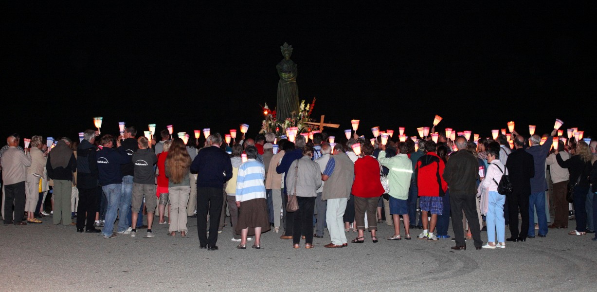 people with candles in the La Salette sanctuary, France, Europe, August 2013, picture 35
