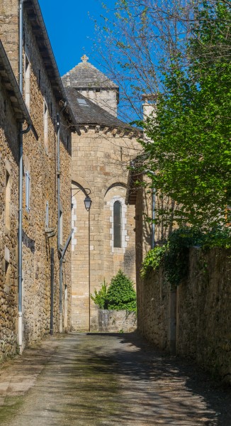 Street in Montrozier with the Saint Faith Church