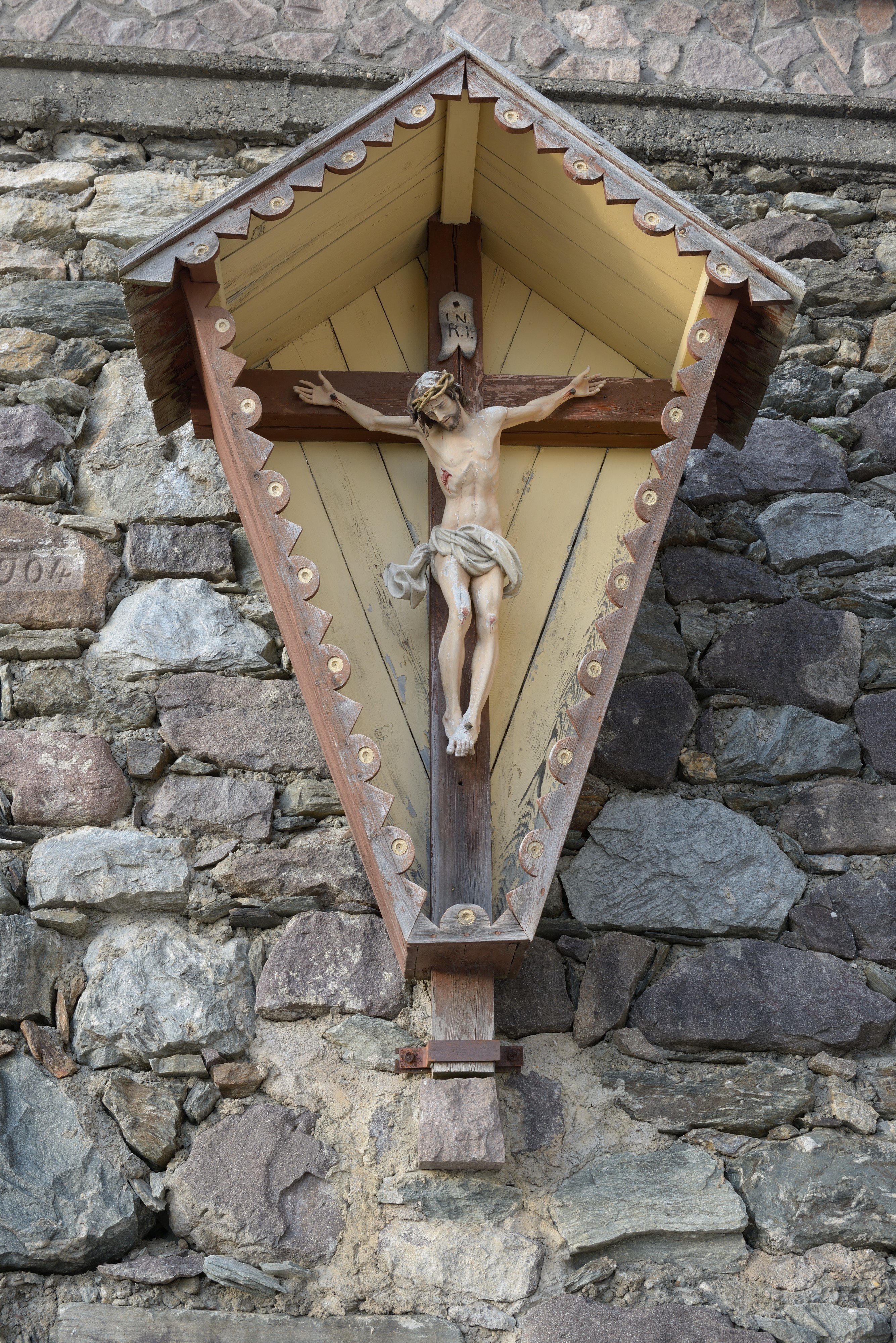 Crucifix on wall parish church S Peter Lajen