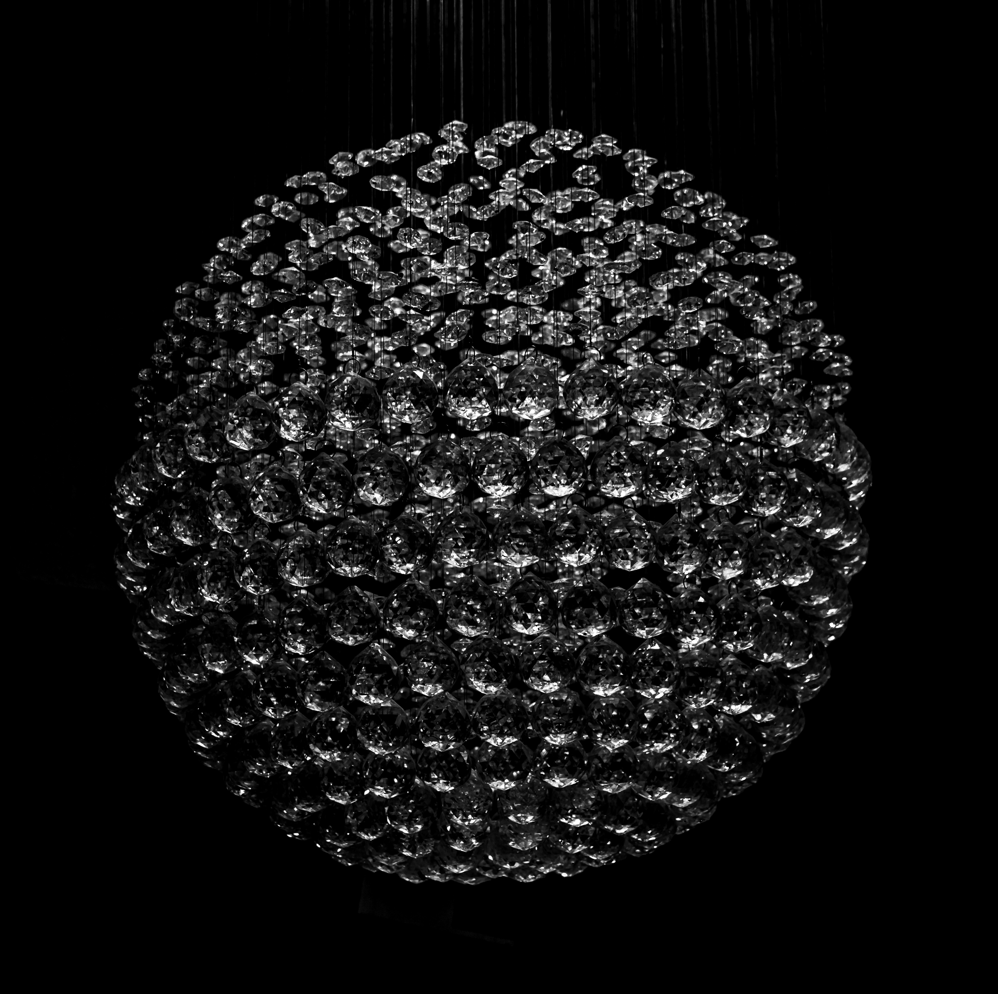 A crystal chandelier in B&W