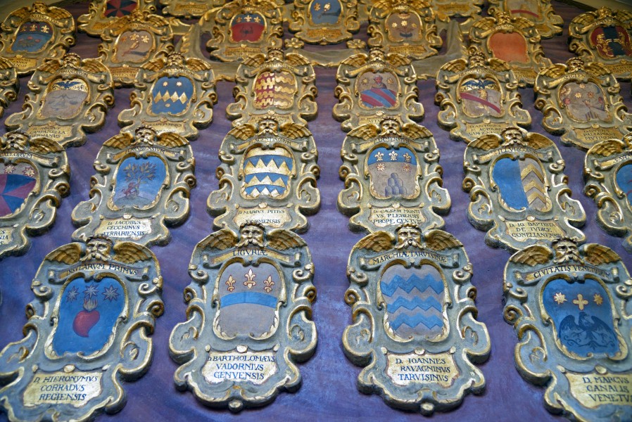 Coats of arms of alumnus on the walls of the Archiginnasio of Bologna. Italy