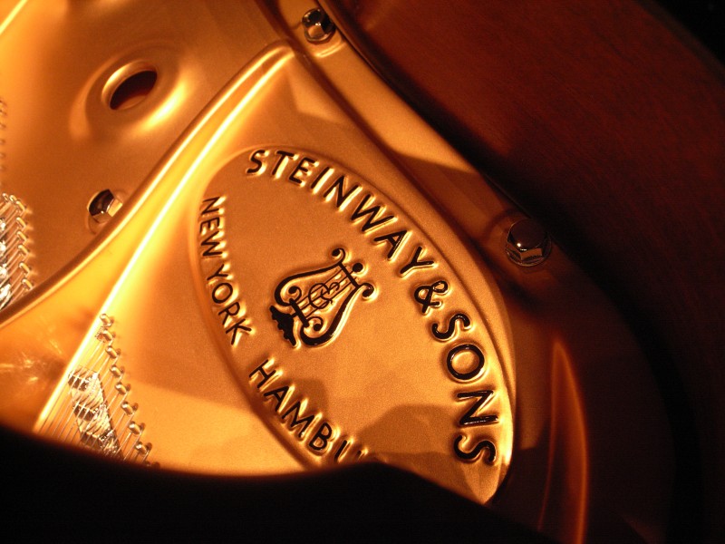 Steinway & Sons bronzed cast iron plate with handpainted logo