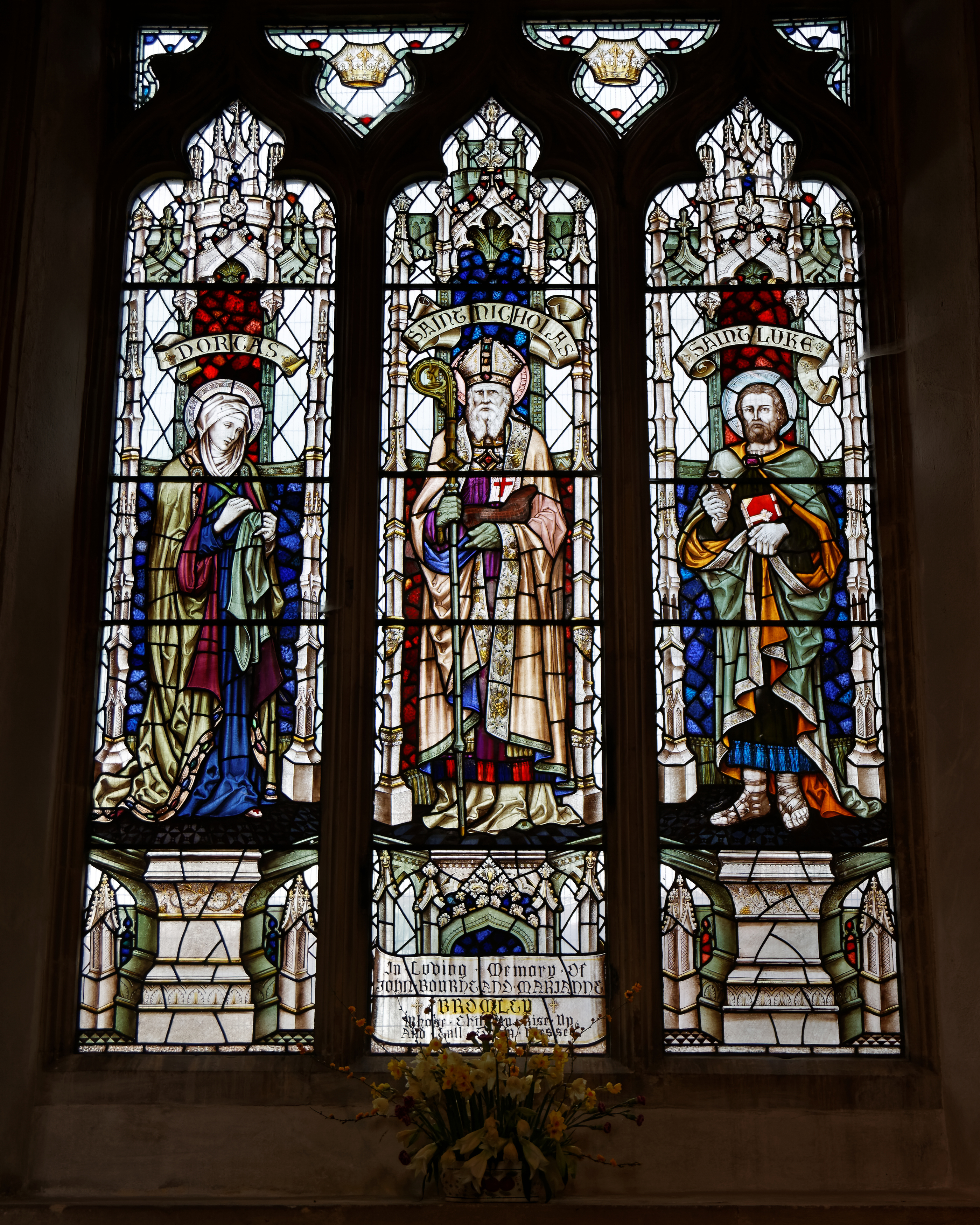 Castle Hedingham, St Nicholas' Church, Essex England, stained glass window, Dorcas, St Nicholas and St Luke in north aisle