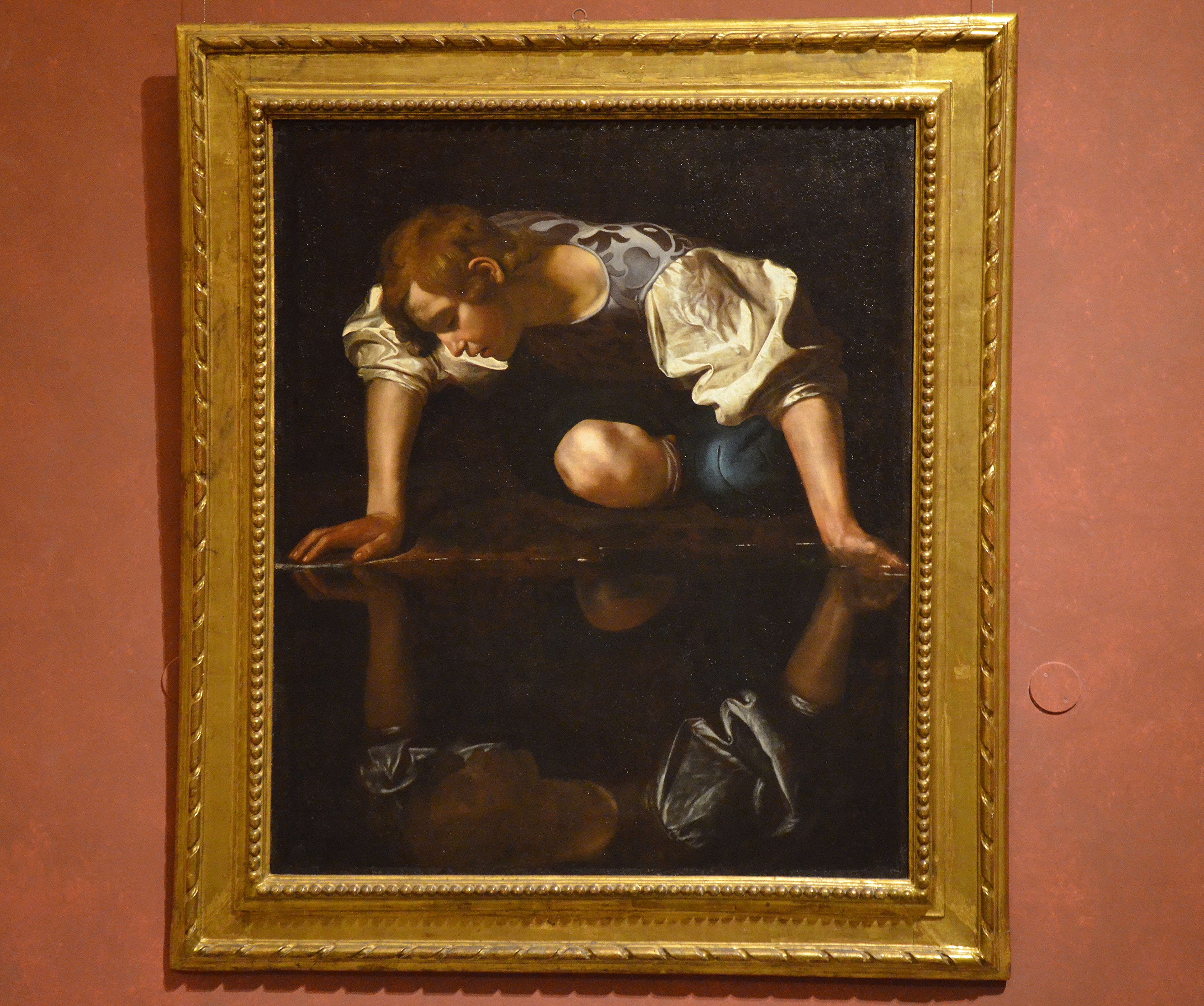 Narcissus by Caravaggio, 1597–1599, Galleria Nazionale d'Arte Antica (21809913606)