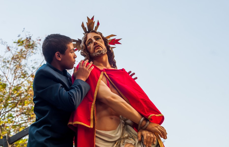 Boy wearing Jesus before the procession