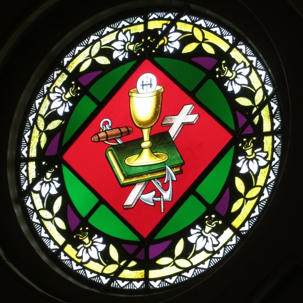Holy Trinity Catholic Church (Trinity, Indiana) - stained glass, Host & Chalice on the Bible, Cross, and anchor