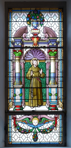 Saint Francis on stained glass window in the Saint Antony church in St. Ulrich in Gröden