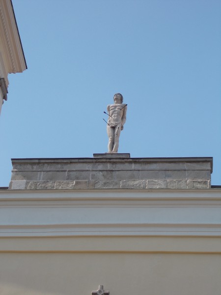The statue of St. Sebastian (János Braun, 1978). 3 and half meters high, chalk artwork. At the top of Saint Sebastian church. Listed ID 3868. - Móri Street, Székesfehérvár, Fejér county, Hungary