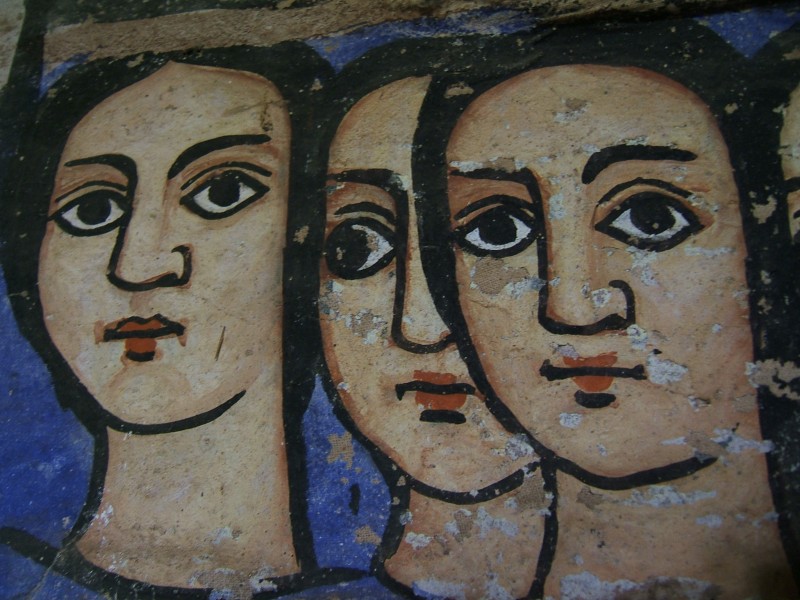 Three faces on a Wall in Bahar Dar