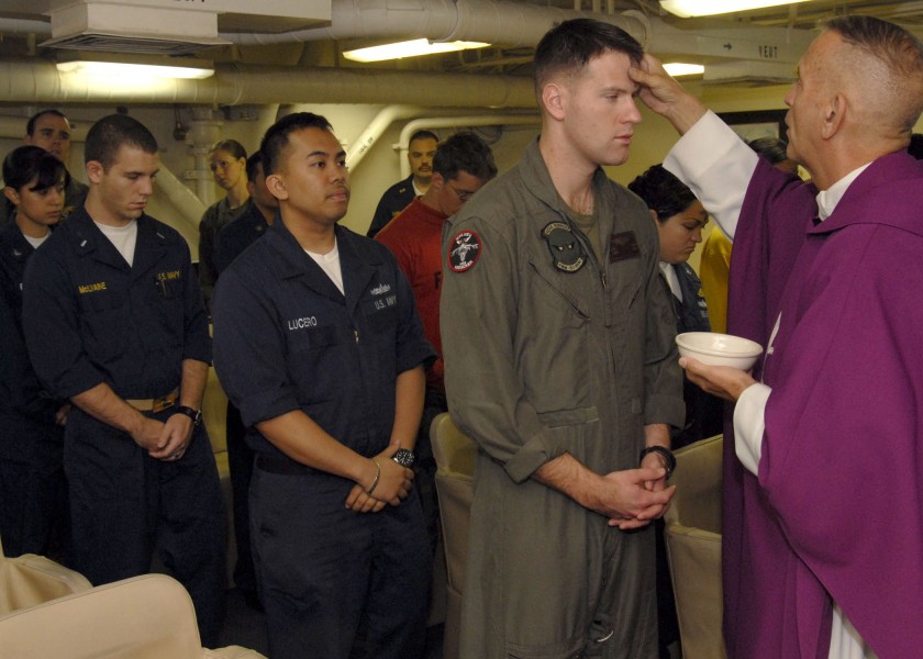 US Navy 090225-N-8283S-018 Sailors and Marines prepare to receive ashes during Ash Wednesday Mass aboard the amphibious assault ship USS Boxer (LHD 4)