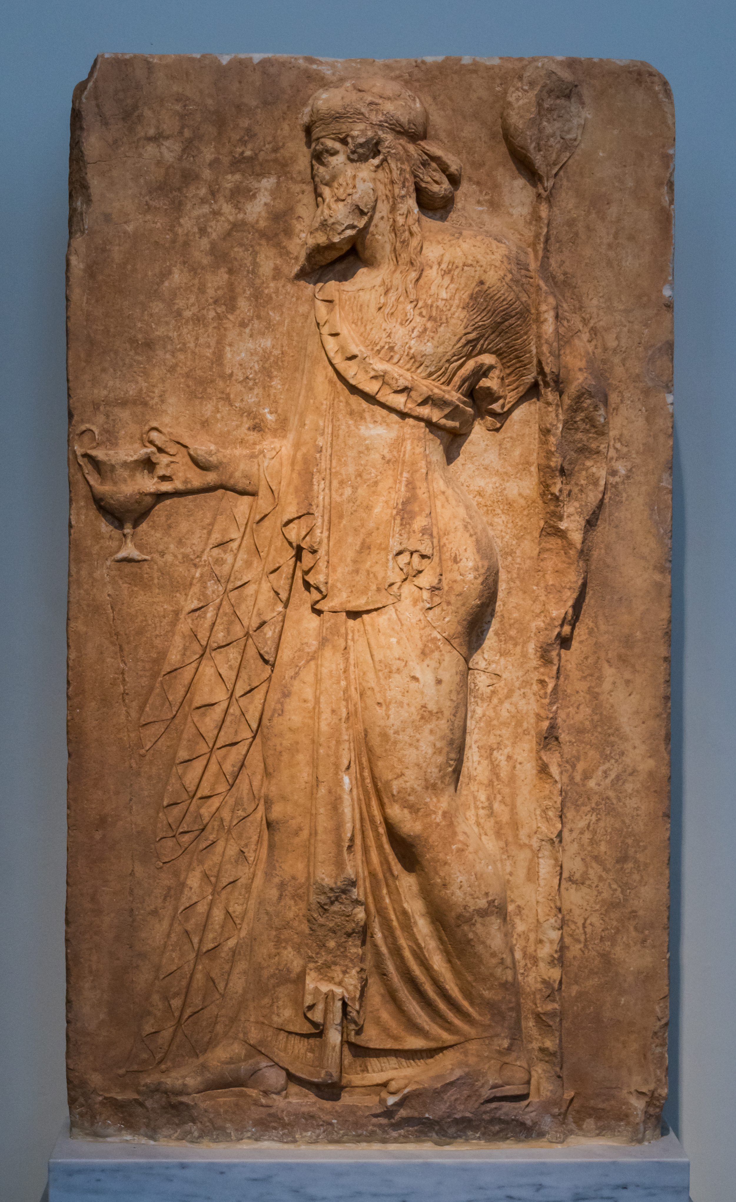 NAMA 3727 Dionysos holding a kantaros and a thyrsos votive relief