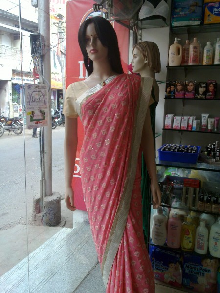 A indian lady doll wearing saree