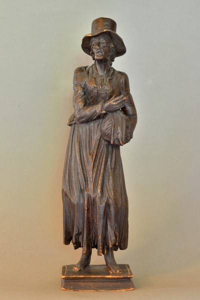 Beggar woman carved in pinewood Gröden
