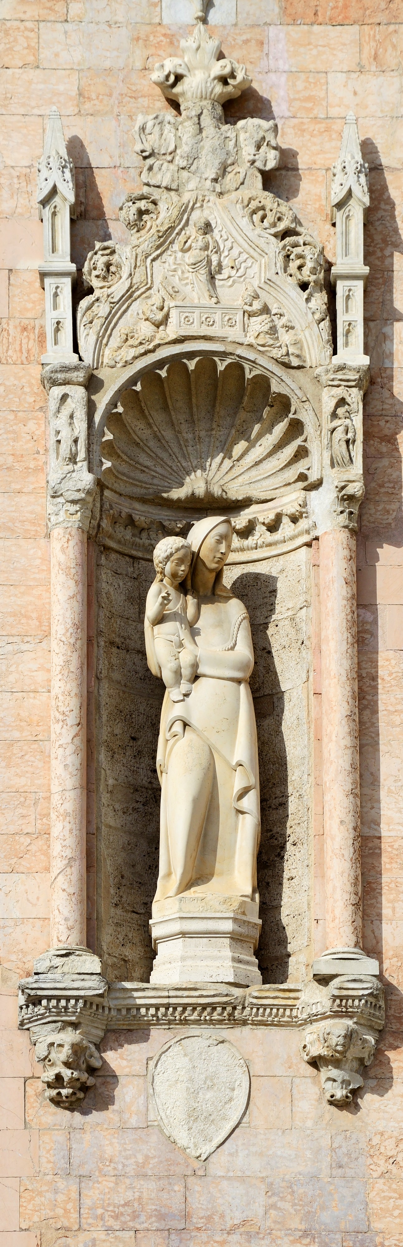 Medieval statue of Madonna on Duomo of Perugia