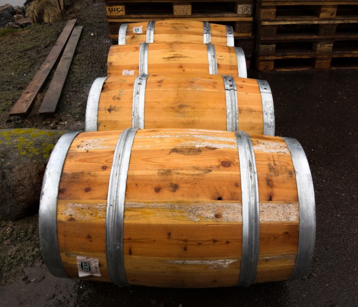 Four wet wooden barrels
