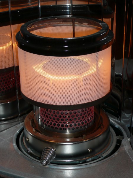 Two stage petroleum heater combustion