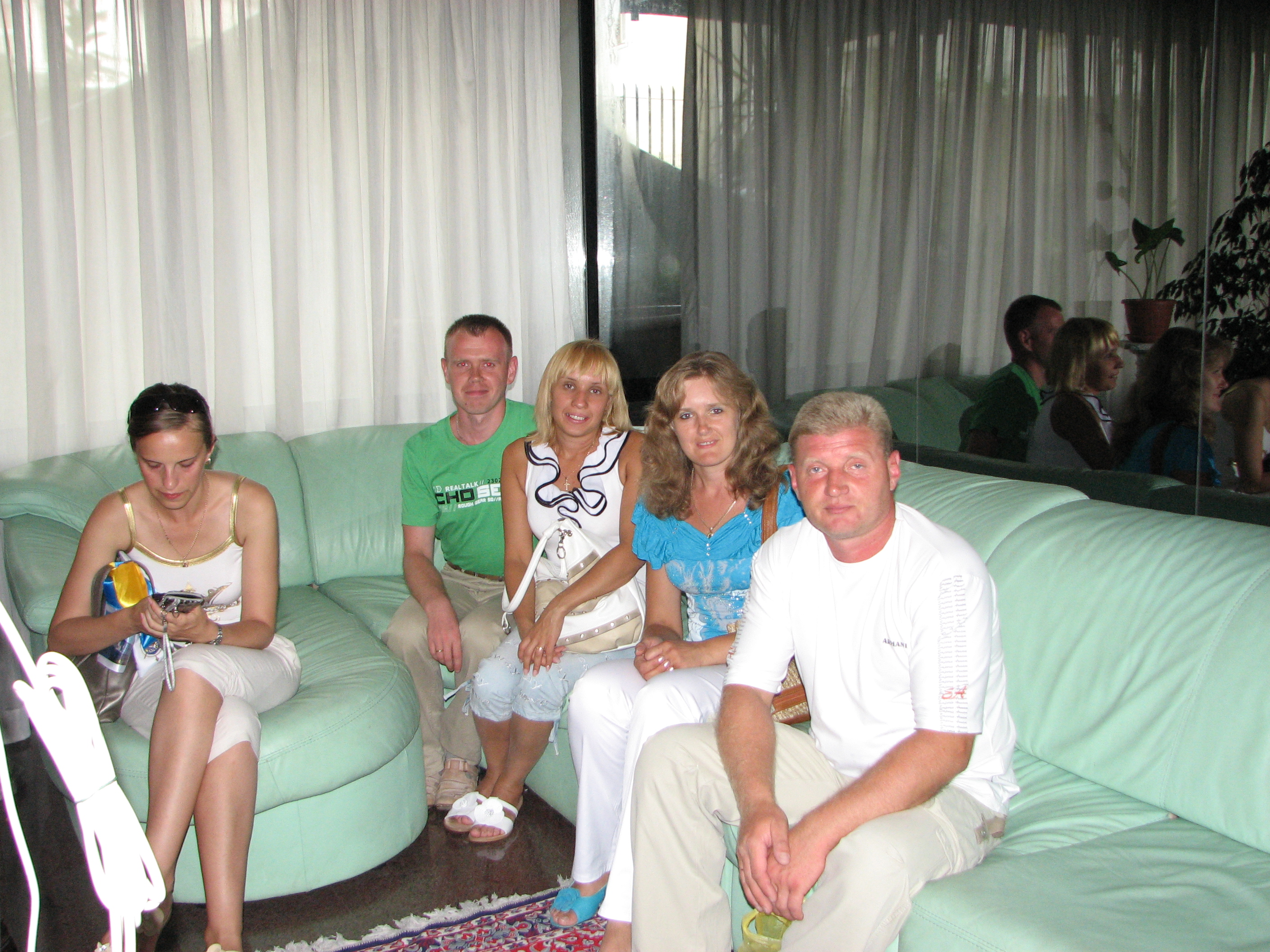 People in a hotel's lobby in Bari city, southern Italy, summer 2011, picture 1