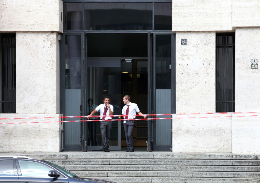 two men near the Italian Stock Exchange in Milan, Italy, European Union, August 2013, picture 53