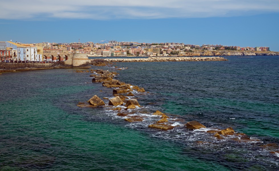 View of Syracuse and Mount Etna from Lungomare Di Levante Ortigia. Sicily, Italy