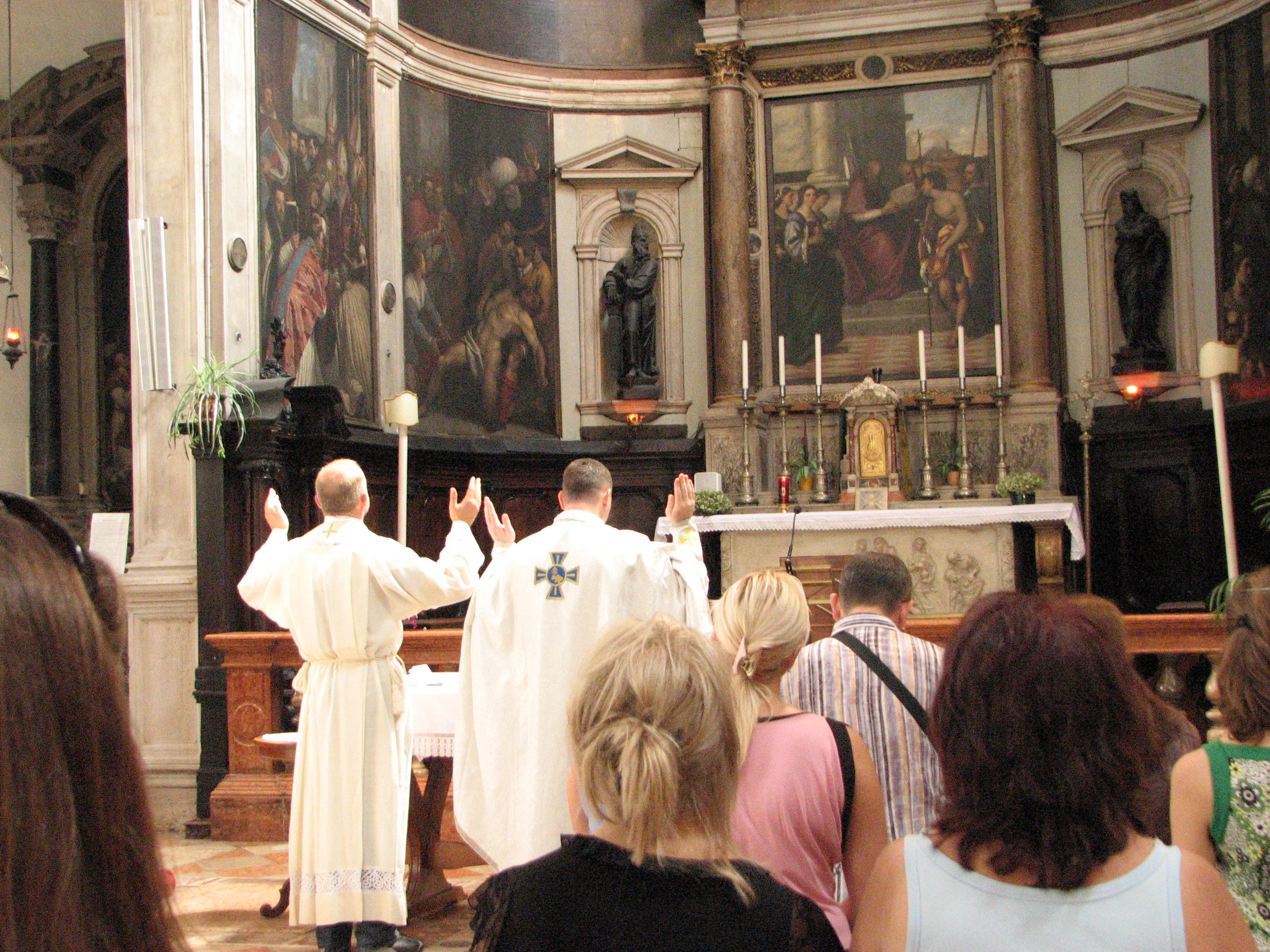People in a Catholic Church in Venice, Italy, European Union, August 2011, picture 15