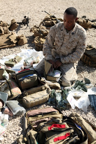 US Navy 081110-M-6159T-017 Hospital Corpsman Lucas Jetson prepares his field medical bag