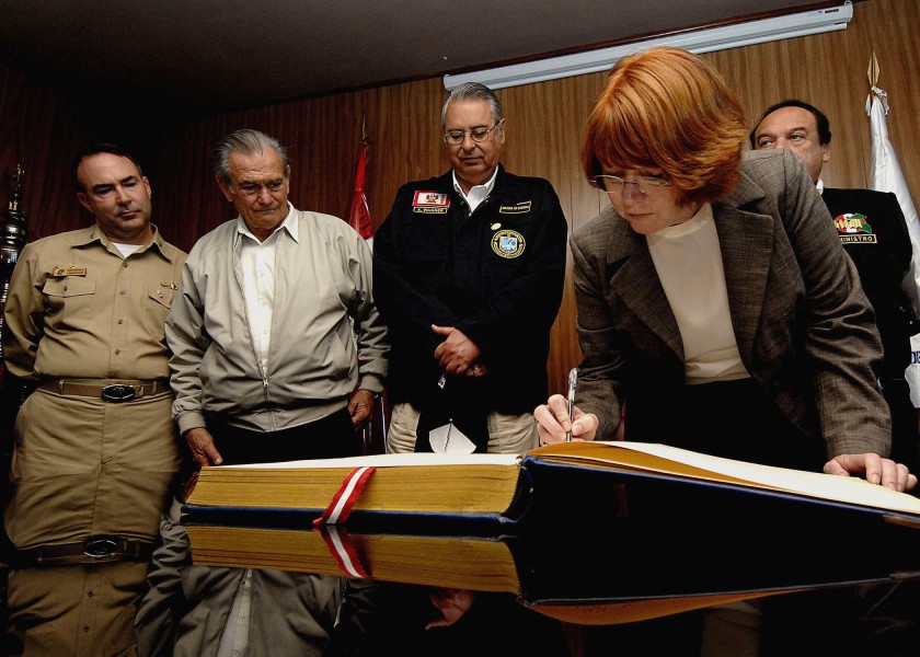 US Navy 070809-N-6278K-166 Caryn Hollis, U.S. Southern Command^rsquo,s director of joint interagency partnering, signs a guest book at Trujillo Regional Teaching Hospital