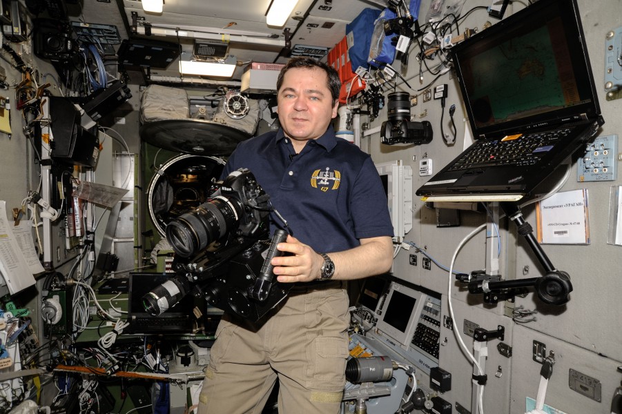 ISS-47 Oleg Skripochka with a camera in the Zvezda Service Module