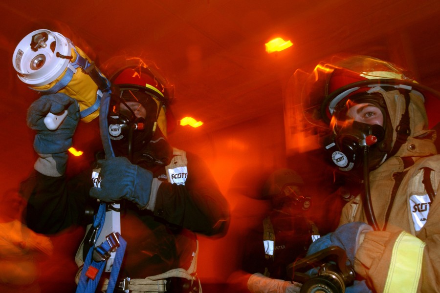 US Navy 040421-N-4757S-008 A sailor aboard USS Harry S. Truman (CVN 75) uses a Naval Firefighting Thermal Imager (NFTI) during a General Quarters (GQ) fire fighting drill