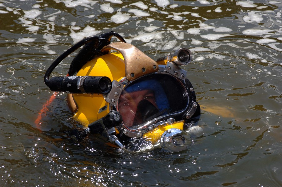 US Navy 070811-N-3093M-009 Chief Navy Diver Scott Maynard attached to Mobile Diving and Salvage Unit (MDSU) 2 from Naval Amphibious Base Little Creek, Va., prepares to leave the surface on a salvage dive in the Mississippi Rive