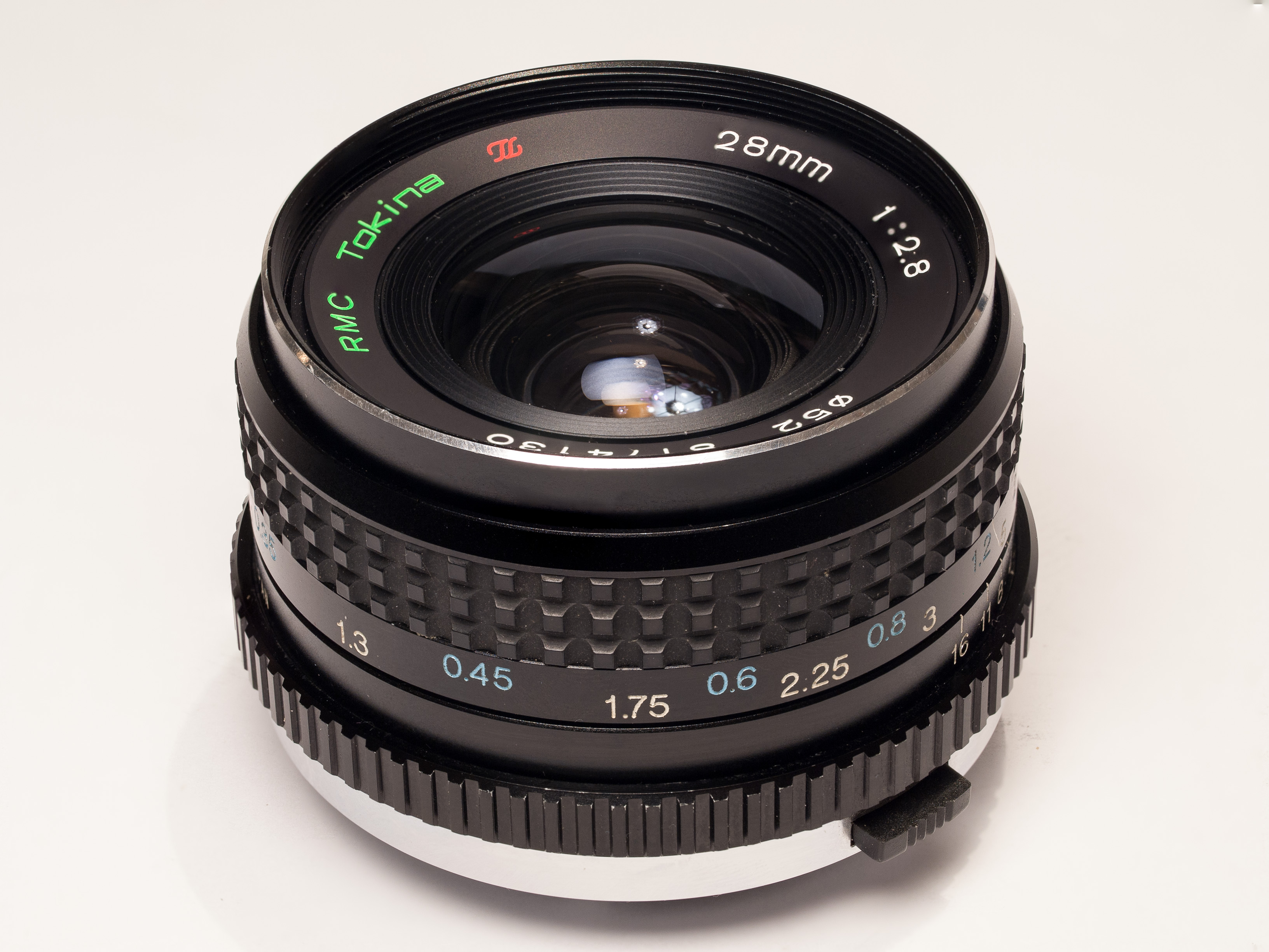 RMC Tokina 28mm lens for Olympus OM