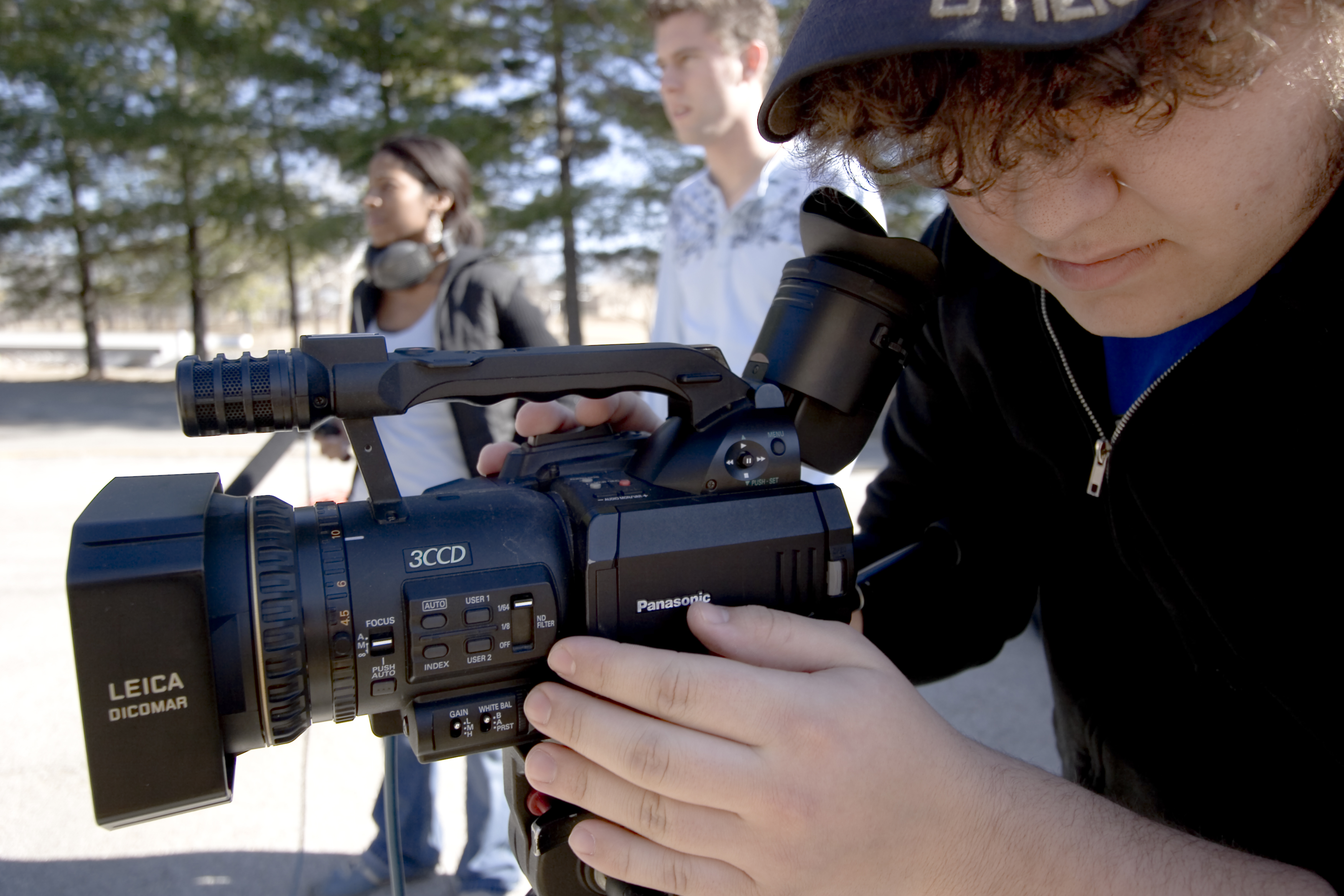 Student with film camera