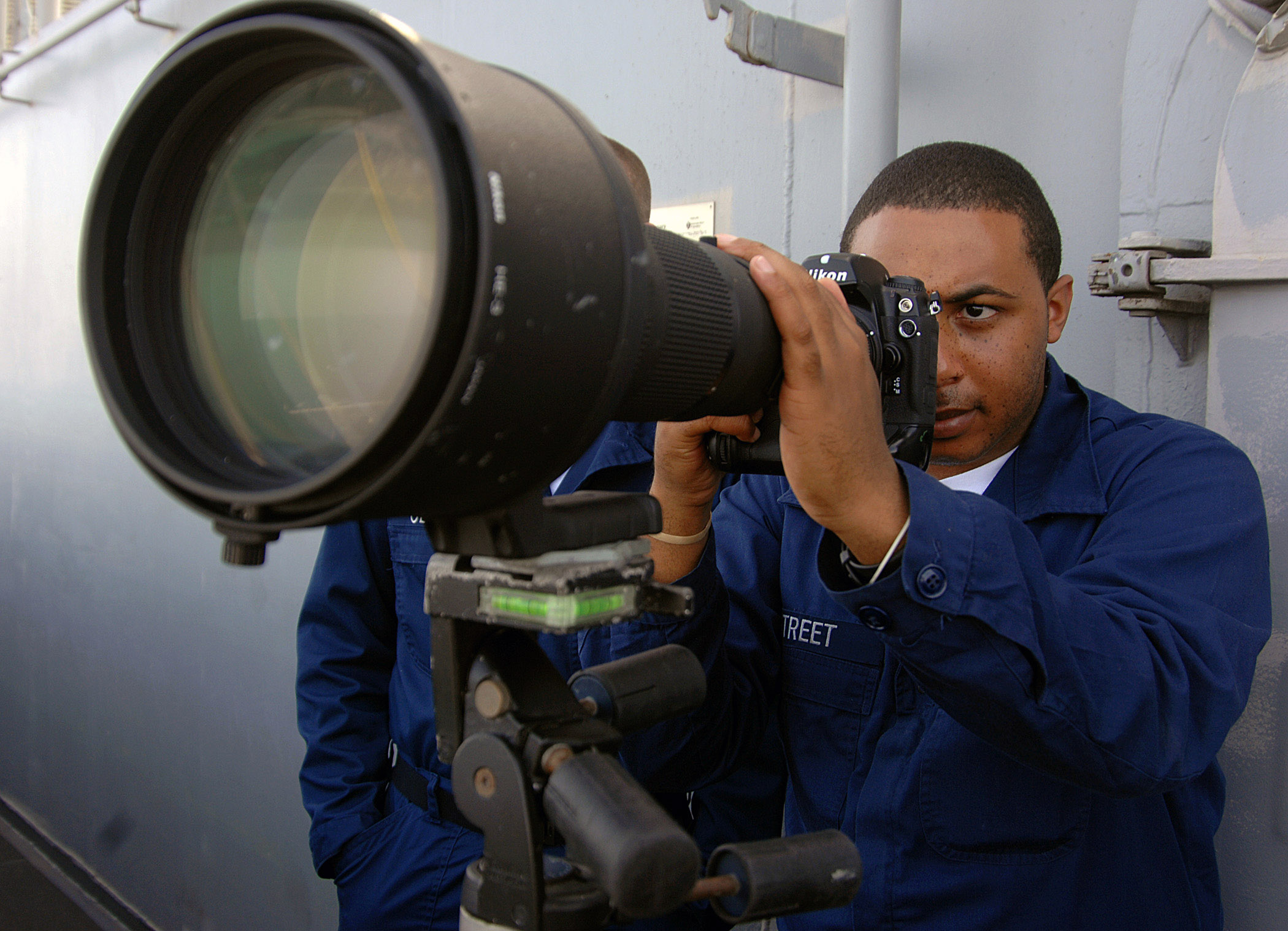 US Navy 071210-N-8923M-048 Mass Communication Specialist Seaman Daron Street takes a photo from Vulture's Row