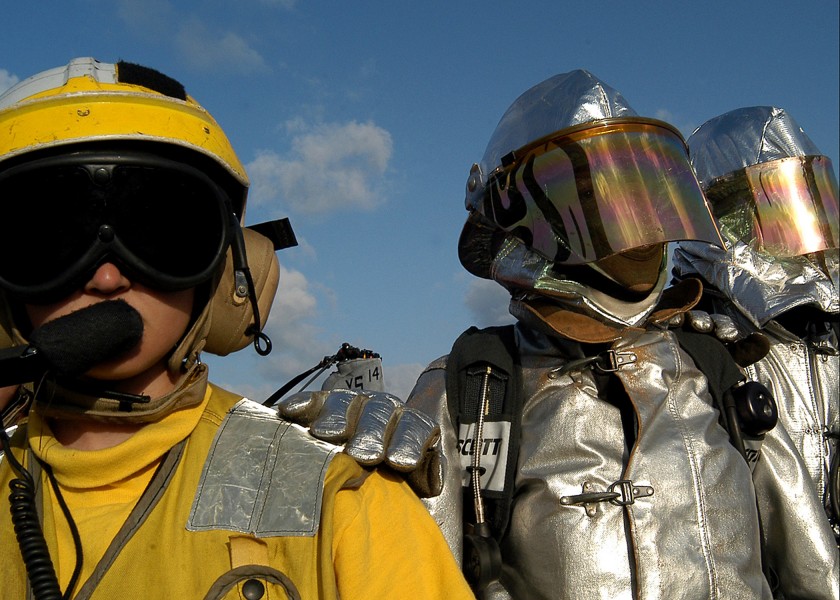 US Navy 030211-N-4048T-044 Sailors assigned to the Crash and Salvage Team conduct a flight deck fire drill