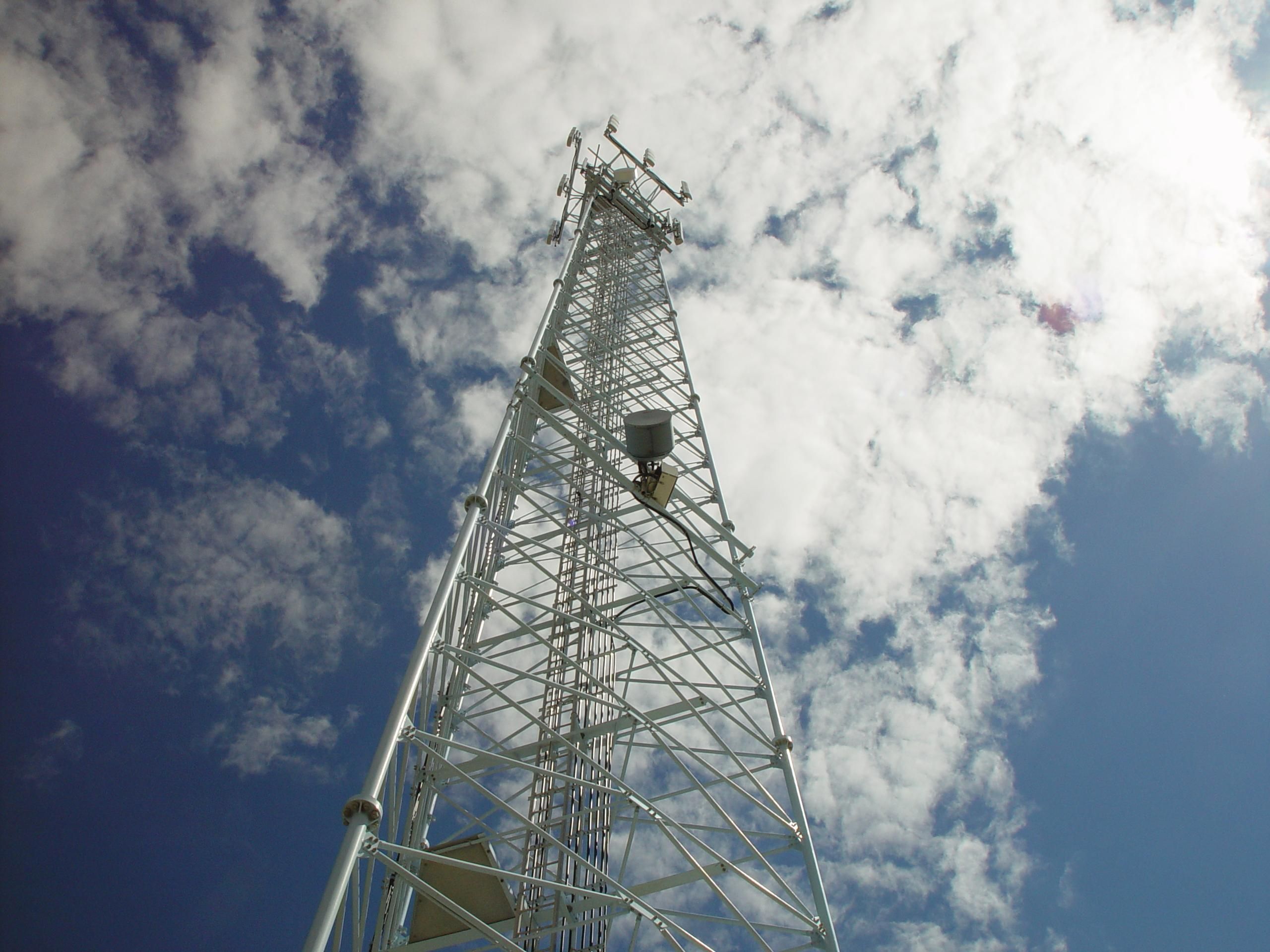 Communications tower reaching for the clouds