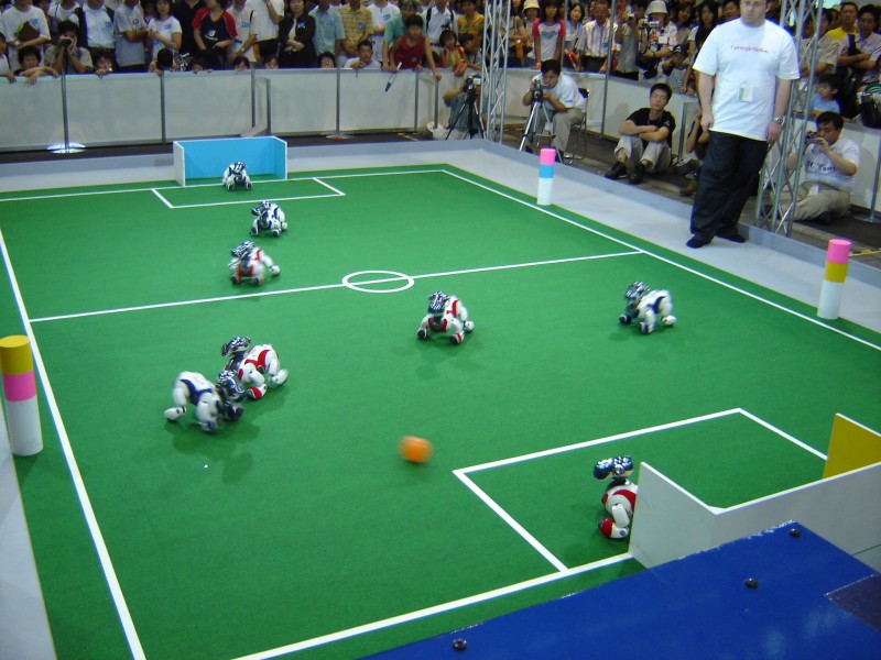 Aibos playing football at Robocup 2005