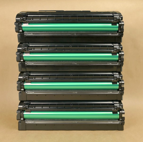 Four Samsung laser toner cartridges front view