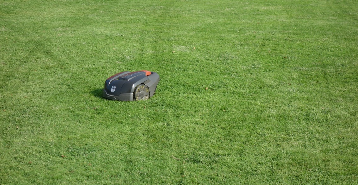 Husqvarna Automower 308 with track marks in lawn