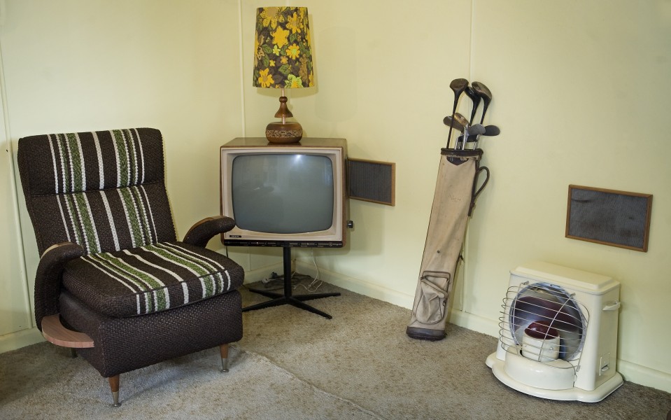 TV set, Golf clubs and other furniture in a beach house, Auckland - 1022
