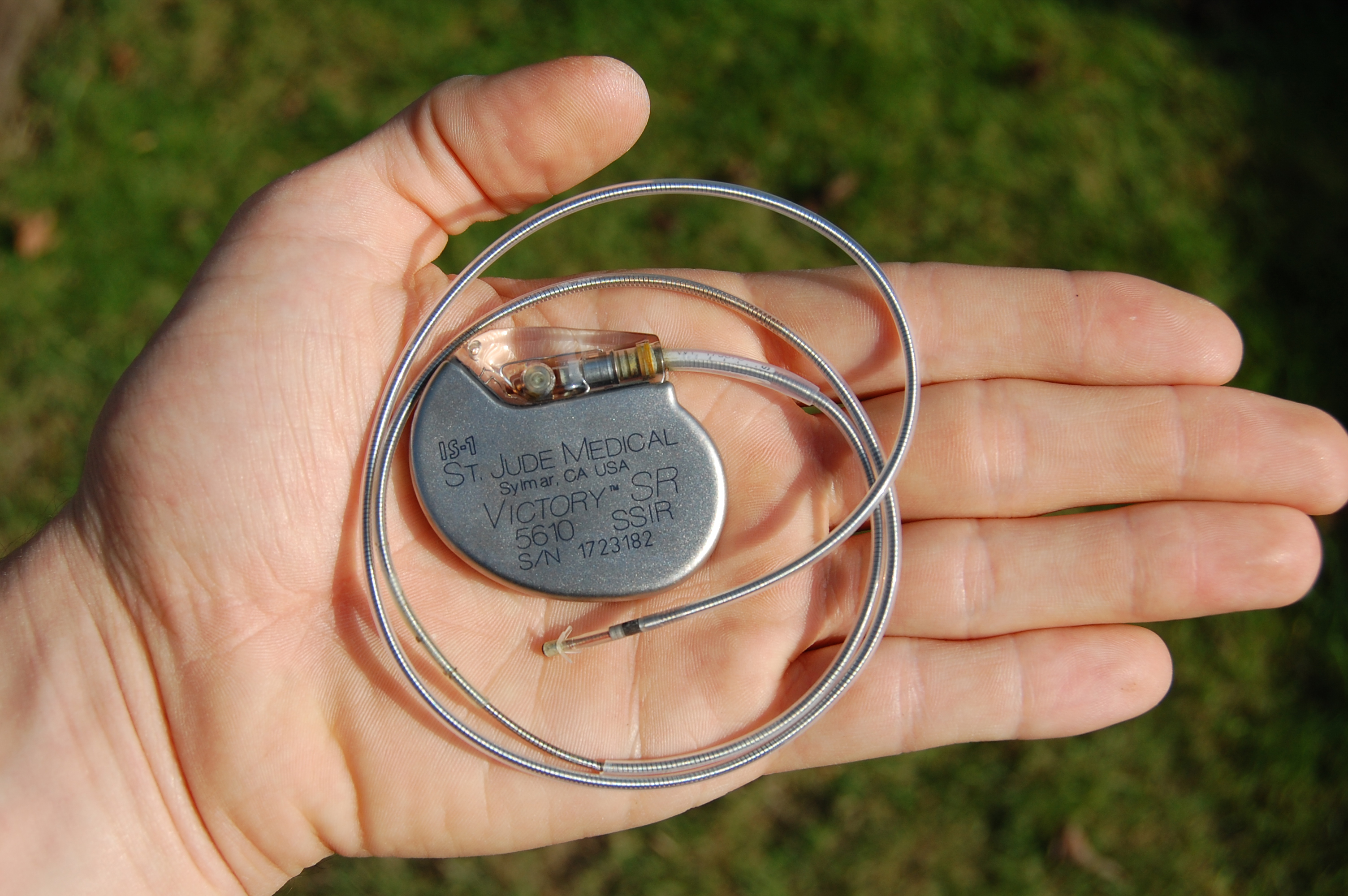 St Jude Medical pacemaker in hand