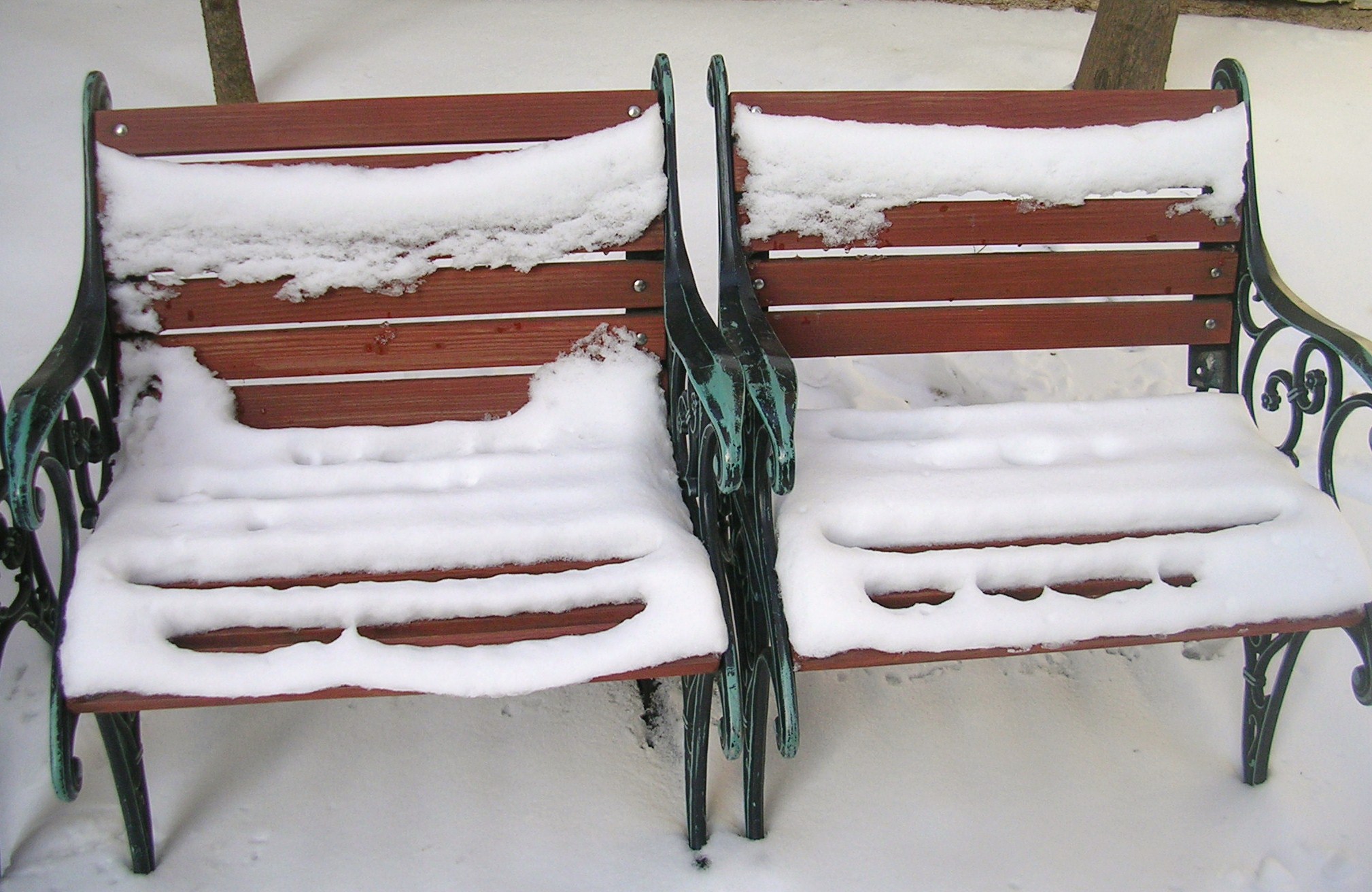 Two snowy benches