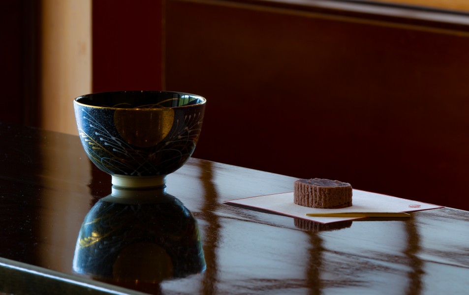Matcha chawan and wagashi at teahouse in Japanese garden